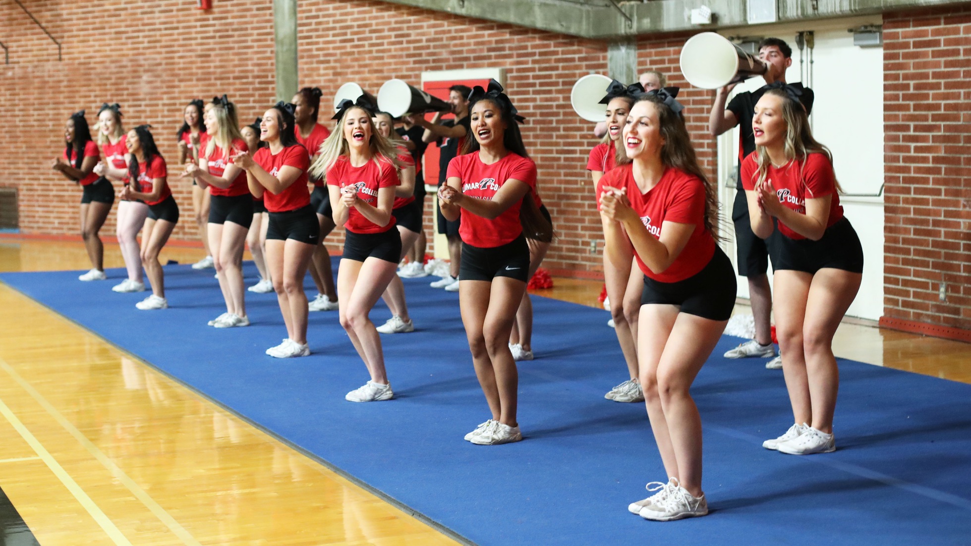 Cheerleaders at the final regular-season basketball game. Photo by Hugh Cox.